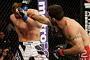 SAN JOSE, CA - APRIL 20:   (R-L) Matt Brown punches Jordan Mein in their welterweight bout during the UFC on FOX event at the HP Pavilion on April 20, 2013 in San Jose, California.  (Photo by Ezra Shaw/Zuffa LLC/Zuffa LLC via Getty Images)  *** Local Caption *** Matt Brown; Jordan Mein