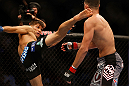SAN JOSE, CA - APRIL 20:   (L-R) Josh Thomson kicks Nate Diaz in their lightweight bout during the UFC on FOX event during the UFC on FOX event at the HP Pavilion on April 20, 2013 in San Jose, California.  (Photo by Josh Hedges/Zuffa LLC/Zuffa LLC via Getty Images)  *** Local Caption *** Nate Diaz; Josh Thomson