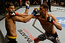 SAN JOSE, CA - APRIL 20:   (R-L) Nate Diaz punches Josh Thomson in their lightweight bout during the UFC on FOX event at the HP Pavilion on April 20, 2013 in San Jose, California.  (Photo by Ezra Shaw/Zuffa LLC/Zuffa LLC via Getty Images)  *** Local Caption *** Nate Diaz; Josh Thomson