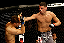 SAN JOSE, CA - APRIL 20:   (R-L) Nate Diaz punches Josh Thomson in their lightweight bout during the UFC on FOX event at the HP Pavilion on April 20, 2013 in San Jose, California.  (Photo by Ezra Shaw/Zuffa LLC/Zuffa LLC via Getty Images)  *** Local Caption *** Nate Diaz; Josh Thomson