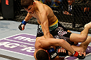SAN JOSE, CA - APRIL 20:   Josh Thomson (top) punches Nate Diaz in their lightweight bout during the UFC on FOX event at the HP Pavilion on April 20, 2013 in San Jose, California.  (Photo by Ezra Shaw/Zuffa LLC/Zuffa LLC via Getty Images)  *** Local Caption *** Nate Diaz; Josh Thomson