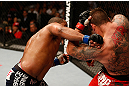 SAN JOSE, CA - APRIL 20:   (L-R) Daniel Cormier punches Frank Mir in their heavyweight bout during the UFC on FOX event during the UFC on FOX event at the HP Pavilion on April 20, 2013 in San Jose, California.  (Photo by Josh Hedges/Zuffa LLC/Zuffa LLC via Getty Images)  *** Local Caption *** Frank Mir; Daniel Cormier