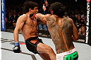 SAN JOSE, CA - APRIL 20:   (R-L) Benson Henderson punches Gilbert Melendez in their lightweight championship bout during the UFC on FOX event during the UFC on FOX event at the HP Pavilion on April 20, 2013 in San Jose, California.  (Photo by Josh Hedges/Zuffa LLC/Zuffa LLC via Getty Images)  *** Local Caption *** Benson Henderson; Gilbert Melendez
