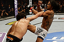 SAN JOSE, CA - APRIL 20:   (L-R) Gilbert Melendez punches Benson Henderson in their lightweight championship bout during the UFC on FOX event at the HP Pavilion on April 20, 2013 in San Jose, California.  (Photo by Ezra Shaw/Zuffa LLC/Zuffa LLC via Getty Images)  *** Local Caption *** Benson Henderson; Gilbert Melendez