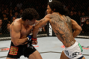 SAN JOSE, CA - APRIL 20:   (R-L) Benson Henderson punches Gilbert Melendez in their lightweight championship bout during the UFC on FOX event at the HP Pavilion on April 20, 2013 in San Jose, California.  (Photo by Ezra Shaw/Zuffa LLC/Zuffa LLC via Getty Images)  *** Local Caption *** Benson Henderson; Gilbert Melendez