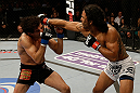 SAN JOSE, CA - APRIL 20:   (R-L) Benson Henderson punches Gilbert Melendez in their lightweight championship bout during the UFC on FOX event at the HP Pavilion on April 20, 2013 in San Jose, California.  (Photo by Ezra Shaw/Zuffa LLC/Zuffa LLC via Getty Images)  *** Local Caption *** Benson Henderson; Gilbert Melendez