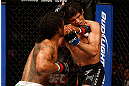 SAN JOSE, CA - APRIL 20:   (L-R) Benson Henderson punches Gilbert Melendez in their lightweight championship bout during the UFC on FOX event during the UFC on FOX event at the HP Pavilion on April 20, 2013 in San Jose, California.  (Photo by Josh Hedges/Zuffa LLC/Zuffa LLC via Getty Images)  *** Local Caption *** Benson Henderson; Gilbert Melendez