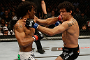 SAN JOSE, CA - APRIL 20:   (L-R) Benson Henderson punches Gilbert Melendez in their lightweight championship bout during the UFC on FOX event at the HP Pavilion on April 20, 2013 in San Jose, California.  (Photo by Ezra Shaw/Zuffa LLC/Zuffa LLC via Getty Images)  *** Local Caption *** Benson Henderson; Gilbert Melendez