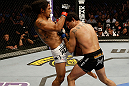 SAN JOSE, CA - APRIL 20:   (L-R) Benson Henderson knees Gilbert Melendez in their lightweight championship bout during the UFC on FOX event at the HP Pavilion on April 20, 2013 in San Jose, California.  (Photo by Ezra Shaw/Zuffa LLC/Zuffa LLC via Getty Images)  *** Local Caption *** Benson Henderson; Gilbert Melendez