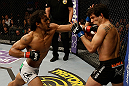 SAN JOSE, CA - APRIL 20:   (L-R) Benson Henderson punches Gilbert Melendez in their lightweight championship bout during the UFC on FOX event at the HP Pavilion on April 20, 2013 in San Jose, California.  (Photo by Ezra Shaw/Zuffa LLC/Zuffa LLC via Getty Images)  *** Local Caption *** Benson Henderson; Gilbert Melendez
