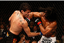 SAN JOSE, CA - APRIL 20:   (R-L) Benson Henderson punches Gilbert Melendez in their lightweight championship bout during the UFC on FOX event during the UFC on FOX event at the HP Pavilion on April 20, 2013 in San Jose, California.  (Photo by Josh Hedges/Zuffa LLC/Zuffa LLC via Getty Images)  *** Local Caption *** Benson Henderson; Gilbert Melendez