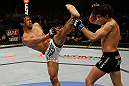 SAN JOSE, CA - APRIL 20:   (L-R) Benson Henderson kicks Gilbert Melendez in their lightweight championship bout during the UFC on FOX event at the HP Pavilion on April 20, 2013 in San Jose, California.  (Photo by Ezra Shaw/Zuffa LLC/Zuffa LLC via Getty Images)  *** Local Caption *** Benson Henderson; Gilbert Melendez