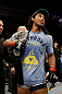 SAN JOSE, CA - APRIL 20:   Benson Henderson is presented with the UFC lightweight championship after his bout with Gilbert Melendez during the UFC on FOX event at the HP Pavilion on April 20, 2013 in San Jose, California.  (Photo by Ezra Shaw/Zuffa LLC/Zuffa LLC via Getty Images)  *** Local Caption *** Benson Henderson; Gilbert Melendez