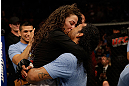 SAN JOSE, CA - APRIL 20:   Benson Henderson (right) kisses his fiancee Maria Magana during the UFC on FOX event at the HP Pavilion on April 20, 2013 in San Jose, California.  (Photo by Ezra Shaw/Zuffa LLC/Zuffa LLC via Getty Images)  *** Local Caption *** Benson Henderson; Maria Magana