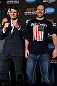 NEW YORK, NY - APRIL 25:   (L-R) Opponents Michael Bisping and Alan Belcher pose for photos during UFC 159 media day at The Theater at Madison Square Garden on April 25, 2013 in New York City.  (Photo by Josh Hedges/Zuffa LLC/Zuffa LLC via Getty Images)