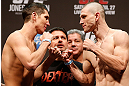 NEWARK, NJ - APRIL 26:   (L-R) Opponents Steven Siler and Kurt Holobaugh face off during the UFC 159 weigh-in event at the Prudential Center on April 26, 2013 in Newark, New Jersey.  (Photo by Josh Hedges/Zuffa LLC/Zuffa LLC via Getty Images)