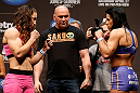 NEWARK, NJ - APRIL 26:   (L-R) Opponents Sara McMann and Sheila Gaff face off during the UFC 159 weigh-in event at the Prudential Center on April 26, 2013 in Newark, New Jersey.  (Photo by Josh Hedges/Zuffa LLC/Zuffa LLC via Getty Images)