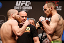 NEWARK, NJ - APRIL 26:   (L-R) Opponents Jim Miller and Pat Healy face off during the UFC 159 weigh-in event at the Prudential Center on April 26, 2013 in Newark, New Jersey.  (Photo by Josh Hedges/Zuffa LLC/Zuffa LLC via Getty Images)