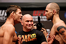NEWARK, NJ - APRIL 26:   (L-R) Opponents Michael Bisping and Alan Belcher face off during the UFC 159 weigh-in event at the Prudential Center on April 26, 2013 in Newark, New Jersey.  (Photo by Josh Hedges/Zuffa LLC/Zuffa LLC via Getty Images)
