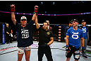NEWARK, NJ - APRIL 27:  Steven Siler (L) is announced winner by unanimous decision in his featherweight bout against Kurt Holobaugh (R) during the UFC 159 event at the Prudential Center on April 27, 2013 in Newark, New Jersey.  (Photo by Al Bello/Zuffa LLC/Zuffa LLC Via Getty Images)