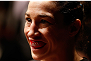 NEWARK, NJ - APRIL 27:   Sara McMann prepares to enter the Octagon before her bantamweight fight against Sheila Gaff during the UFC 159 event at the Prudential Center on April 27, 2013 in Newark, New Jersey.  (Photo by Josh Hedges/Zuffa LLC/Zuffa LLC via Getty Images)