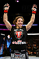 NEWARK, NJ - APRIL 27:  Sara McMann celebrates defeating Sheila Gaff by KO/TKO in round one of their women's bantamweight bout during the UFC 159 event at the Prudential Center on April 27, 2013 in Newark, New Jersey.  (Photo by Al Bello/Zuffa LLC/Zuffa LLC Via Getty Images)