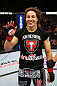 NEWARK, NJ - APRIL 27:  Sara McMann celebrates defeating Sheila Gaff by KO/TKO in round one of their women's bantamweight bout during the UFC 159 event at the Prudential Center on April 27, 2013 in Newark, New Jersey.  (Photo by Al Bello/Zuffa LLC/Zuffa LLC Via Getty Images)