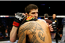 NEWARK, NJ - APRIL 27:  (L-R) Rustam Khabilov of Russia is congratulated by Yancy Medeiros after winning by TKO (Thumb Injury) during their lightweight bout during the UFC 159 event at the Prudential Center on April 27, 2013 in Newark, New Jersey.  (Photo by Al Bello/Zuffa LLC/Zuffa LLC Via Getty Images)