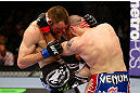NEWARK, NJ - APRIL 27: Pat Healy (L) knees Jim Miller (R) in their lightweight bout during the UFC 159 event at the Prudential Center on April 27, 2013 in Newark, New Jersey.  (Photo by Al Bello/Zuffa LLC/Zuffa LLC Via Getty Images)