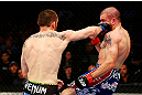 NEWARK, NJ - APRIL 27: (L-R) Pat Healy throws a right punch against Jim Miller in their lightweight bout during the UFC 159 event at the Prudential Center on April 27, 2013 in Newark, New Jersey.  (Photo by Al Bello/Zuffa LLC/Zuffa LLC Via Getty Images)