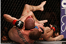 NEWARK, NJ - APRIL 27:   (L-R) Pat Healy secures a rear choke submission against Jim Miller in their lightweight fight during the UFC 159 event at the Prudential Center on April 27, 2013 in Newark, New Jersey.  (Photo by Josh Hedges/Zuffa LLC/Zuffa LLC via Getty Images)
