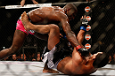 NEWARK, NJ - APRIL 27:   (L-R) Phil Davis punches Vinny Magalhaes in their light heavyweight fight during the UFC 159 event at the Prudential Center on April 27, 2013 in Newark, New Jersey.  (Photo by Josh Hedges/Zuffa LLC/Zuffa LLC via Getty Images)