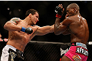 NEWARK, NJ - APRIL 27:   (L-R) Vinny Magalhaes punches Phil Davis in their light heavyweight fight during the UFC 159 event at the Prudential Center on April 27, 2013 in Newark, New Jersey.  (Photo by Josh Hedges/Zuffa LLC/Zuffa LLC via Getty Images)