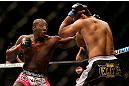 NEWARK, NJ - APRIL 27:   (L-R) Phil Davis punches Vinny Magalhaes in their light heavyweight fight during the UFC 159 event at the Prudential Center on April 27, 2013 in Newark, New Jersey.  (Photo by Josh Hedges/Zuffa LLC/Zuffa LLC via Getty Images)