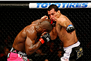 NEWARK, NJ - APRIL 27:  Phil Davis throws a punch against Vinny Magalhaes in their light heavyweight bout during the UFC 159 event at the Prudential Center on April 27, 2013 in Newark, New Jersey.  (Photo by Al Bello/Zuffa LLC/Zuffa LLC Via Getty Images)