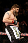 NEWARK, NJ - APRIL 27:  Roy Nelson sits on the side of the octagon in celebration of his win by knockout against Cheick Kongo of France in their heavyweight bout during the UFC 159 event at the Prudential Center on April 27, 2013 in Newark, New Jersey.  (Photo by Al Bello/Zuffa LLC/Zuffa LLC Via Getty Images)