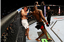 NEWARK, NJ - APRIL 27:  Chael Sonnen defends himself against Jon Jones in their light heavyweight championship bout during the UFC 159 event at the Prudential Center on April 27, 2013 in Newark, New Jersey.  (Photo by Al Bello/Zuffa LLC/Zuffa LLC Via Getty Images)