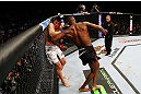 NEWARK, NJ - APRIL 27:  Chael Sonnen defends himself against Jon Jones in their light heavyweight championship bout during the UFC 159 event at the Prudential Center on April 27, 2013 in Newark, New Jersey.  (Photo by Al Bello/Zuffa LLC/Zuffa LLC Via Getty Images)