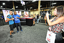LAS VEGAS, NV - JULY 06:  Daniel Cormier interacts with fans at the UFC Fan Expo on July 6, 2012 in Las Vegas, Nevada. (Photo by Al Powers /Zuffa LLC/Zuffa LLC via Getty Images)