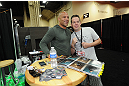 LAS VEGAS, NV - JULY 7:   Frank Trigg poses with fans during the UFC Fan Expo at the Mandalay Bay Convention Center on July 7, 2012 in Las Vegas, Nevada.  (Photo by Al Powers/Zuffa LLC/Zuffa LLC via Getty Images)  *** Local Caption ***