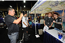 LAS VEGAS, NV - JULY 7:   Scott Jorgensen poses with fans during the UFC Fan Expo at the Mandalay Bay Convention Center on July 7, 2012 in Las Vegas, Nevada.  (Photo by Al Powers/Zuffa LLC/Zuffa LLC via Getty Images)  *** Local Caption ***