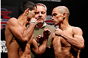 JARAGUA DO SUL, BRAZIL - MAY 17: (L-R) Opponents Jussier Formiga and Chris Cariaso face off during the UFC on FX weigh-in on May 17, 2013 at the Arena Jaragua in Jaragua do Sul, Santa Catarina, Brazil. (Photo by Josh Hedges/Zuffa LLC/Zuffa LLC via Getty Images)