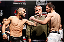 JARAGUA DO SUL, BRAZIL - MAY 17: (L-R) Opponents John Lineker and Azamat Gashimov face off during the UFC on FX weigh-in on May 17, 2013 at the Arena Jaragua in Jaragua do Sul, Santa Catarina, Brazil. (Photo by Josh Hedges/Zuffa LLC/Zuffa LLC via Getty Images)