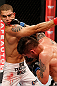 JARAGUA DO SUL, BRAZIL - MAY 18: (R-L) Jeremy Larsen punches Lucas Martins in their lightweight bout during the UFC on FX event on May 18, 2013 at Arena Jaragua in Jaragua do Sul, Santa Catarina, Brazil. (Photo by Josh Hedges/Zuffa LLC/Zuffa LLC via Getty Images)
