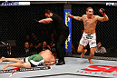 JARAGUA DO SUL, BRAZIL - MAY 18: (R-L) Lucas Martins reacts after knocking out Jeremy Larsen in their lightweight bout during the UFC on FX event on May 18, 2013 at Arena Jaragua in Jaragua do Sul, Santa Catarina, Brazil. (Photo by Josh Hedges/Zuffa LLC/Zuffa LLC via Getty Images)
