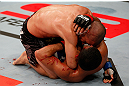 JARAGUA DO SUL, BRAZIL - MAY 18:   (L-R) Chris Cariaso elbows Jussier Formiga in their flyweight bout during the UFC on FX event on May 18, 2013 at Arena Jaragua in Jaragua do Sul, Santa Catarina, Brazil.  (Photo by Josh Hedges/Zuffa LLC/Zuffa LLC via Getty Images)