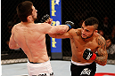 JARAGUA DO SUL, BRAZIL - MAY 18:   (R-L) John Lineker punches Azamat Gashimov in their flyweight bout during the UFC on FX event on May 18, 2013 at Arena Jaragua in Jaragua do Sul, Santa Catarina, Brazil.  (Photo by Josh Hedges/Zuffa LLC/Zuffa LLC via Getty Images)