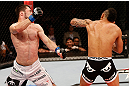JARAGUA DO SUL, BRAZIL - MAY 18:   (R-L) John Lineker punches Azamat Gashimov in their flyweight bout during the UFC on FX event on May 18, 2013 at Arena Jaragua in Jaragua do Sul, Santa Catarina, Brazil.  (Photo by Josh Hedges/Zuffa LLC/Zuffa LLC via Getty Images)