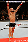 JARAGUA DO SUL, BRAZIL - MAY 18:   John Lineker reacts after knocking out Azamat Gashimov in their flyweight bout during the UFC on FX event on May 18, 2013 at Arena Jaragua in Jaragua do Sul, Santa Catarina, Brazil.  (Photo by Josh Hedges/Zuffa LLC/Zuffa LLC via Getty Images)