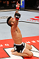 JARAGUA DO SUL, BRAZIL - MAY 18:   John Lineker reacts after knocking out Azamat Gashimov in their flyweight bout during the UFC on FX event on May 18, 2013 at Arena Jaragua in Jaragua do Sul, Santa Catarina, Brazil.  (Photo by Josh Hedges/Zuffa LLC/Zuffa LLC via Getty Images)